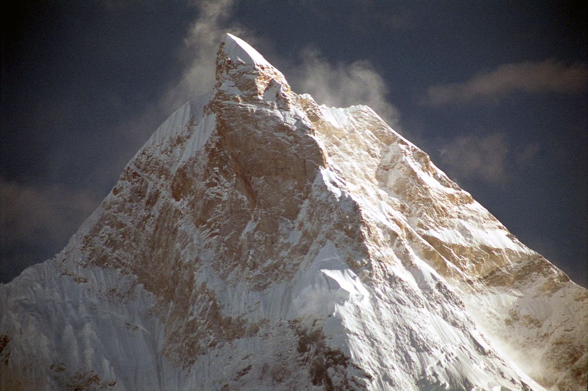 13 Masherbrum Close Up In Late Afternoon Sun From Goro II The clouds started to lift at our camp at Goro II on the Baltoro Glacier and I got my first spectacular view of Masherbrum (7821m, the 24th highest peak in the world). Originally called K1, Masherbrum is a spectacular rock and ice peak, rising to the south of the Baltoro Glacier.